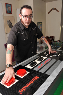 hornierthanmost:  archiemcphee:  This giant NES controller, completely functional and made almost entirely out of LEGO bricks, was created by Baron Julius von Brunk. It’s a super geeky, super awesome project.   “The Baron connected the bricky buttons