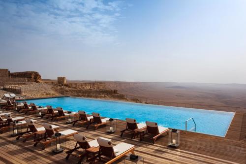 forbes-life:  8 Outrageously Gorgeous Hotel PoolsFloating in any body of water is pretty dreamy, but today’s hospitality  designers have found more and more ways to elevate the humble hotel  swimming pool into a spectacular work of art. The most beautiful