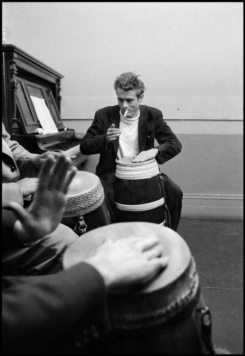 macaulaykulkin:James Dean playing bongo drums in New York City, year 1955