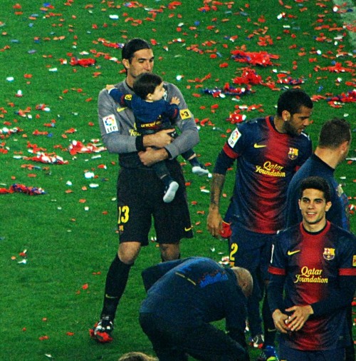 Dani Alves playing peek-a-boo with Nathan Pinto at the La Liga celebration