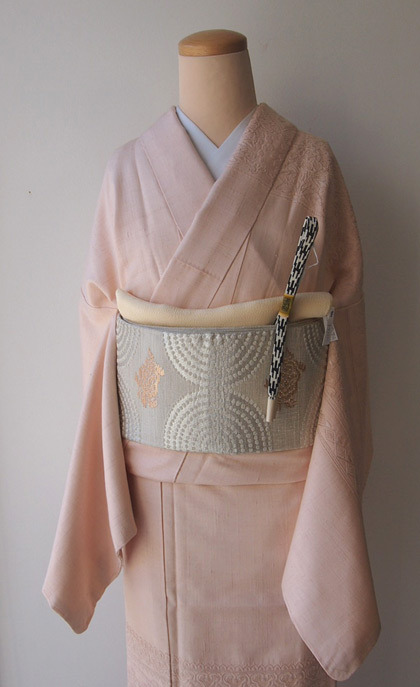 Soft cherry blossom colored kimono, with refined open weave embroidery, paired with silvery ripples 