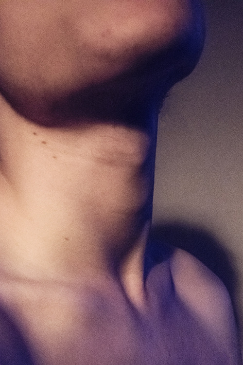 Late night, blue light, jawline.