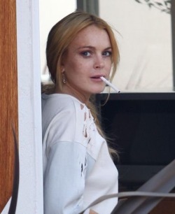 paintdeath:  A photoset of Lindsay Lohan smoking. Thank me for it later