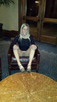 scottnikipowers:  Niki spreading her legs in the lobby of the resort where my company Christmas party was last night!