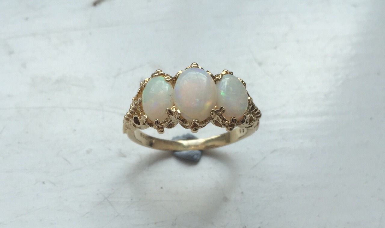 avaricioussunbather:  quartz-thorns:  Beautiful gift from my father. Opals on a unique