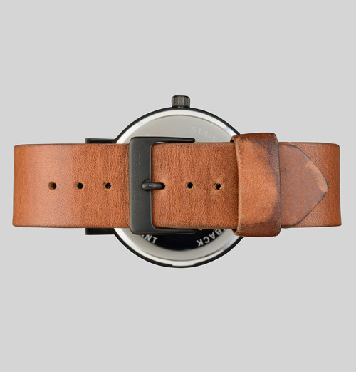 whatisindustrialdesign:  Matte Black & Tan Leather Watch / THEHORSE A simple take on the classic time-teller. Featuring a sandblasted, matte-black stainless steel case, with cool grey face, minimalist markers and premium tan leather band. The Horse
