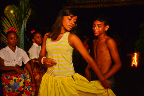 latin-american-diversity: The children of cacao farmers enjoy the night by dancing to traditional Af