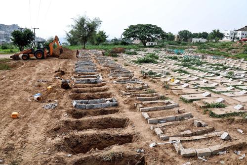 Yemeni workers dig graves for COVID-19 victims, at a cemetery in Taizz, on June 14, 2020.&gt; Photo: