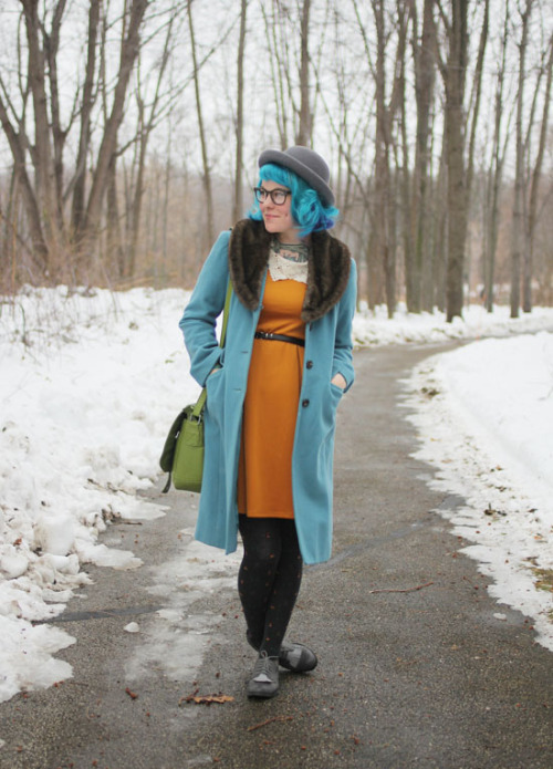 I can always count on Kaylah of The Dainty Squid to bring bright colors into my mid-winter gloom. Her pairing of the mustard Curry Me Away Dress with an ocean blue coat makes me excited for spring hues.