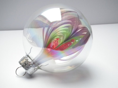 sosuperawesome:  Glass Ornaments - quilled coils in iridescent glass orbs, YakawonisQuilling