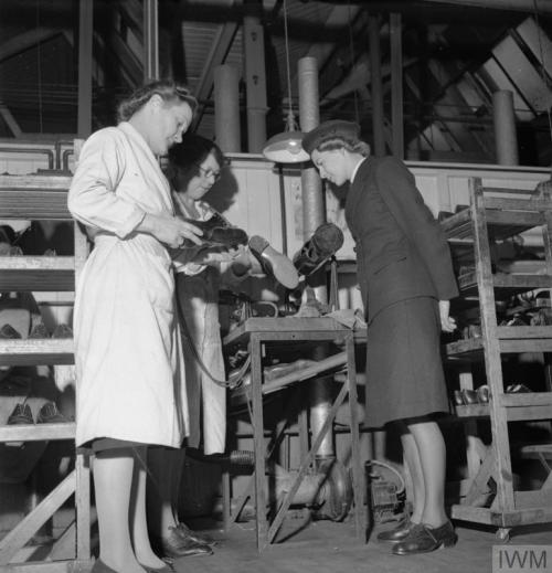 The manufacture of footwear for the Women&rsquo;s Royal Naval Service at afactory in the Midlands (E