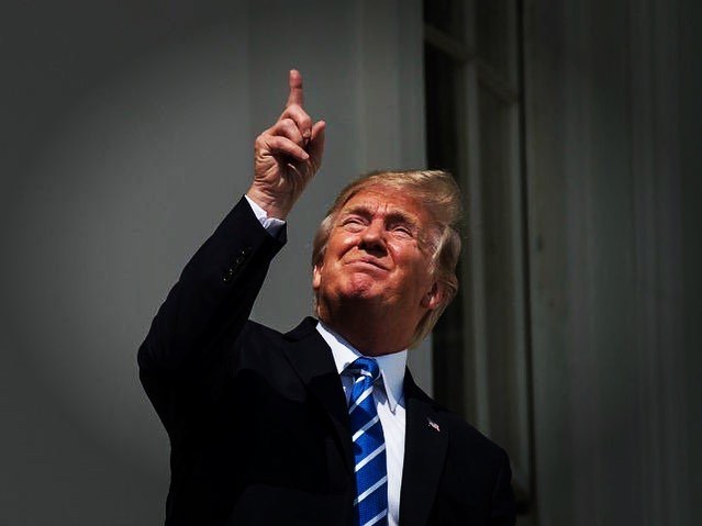 It’s a solar eclipse! DO NOT STARE DIRECTLY INTI THE SUN! The cheetoh, hold my