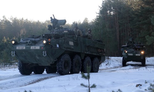 militaryarmament:  Lightning Troop, 3rd Squadron, 2nd Cavalry Regiment get to know the Soldiers and equipment of the Algirdas Battalion, Iron Wolf Brigade, Lithuanian land forces at Rukla, Lithuania, Feb. 2, 2015.