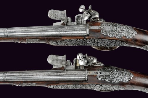 A pair of silver mounted flintlock pistols signed “Lazarino Cominazzo”. Originates from 