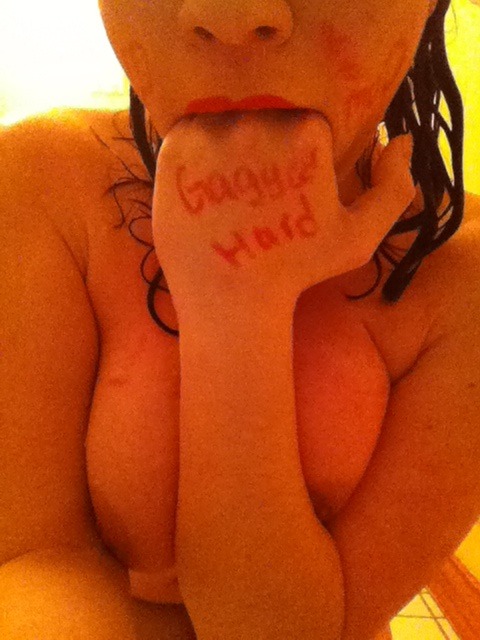 gaggedhard:  Love this submission of a topless cum dumpster shoving her fingers in
