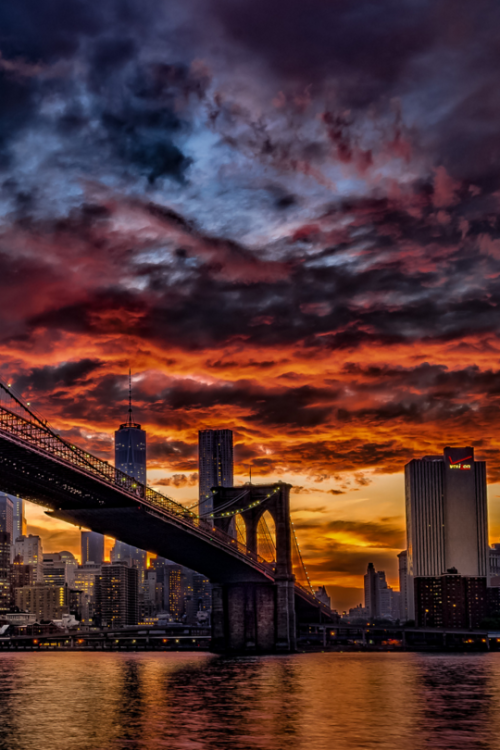 luxuriousimpressions:  Sunset in Manhattan By   Paul Stevens   