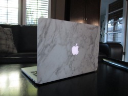 astonishingly:  My marble MacBook skin from