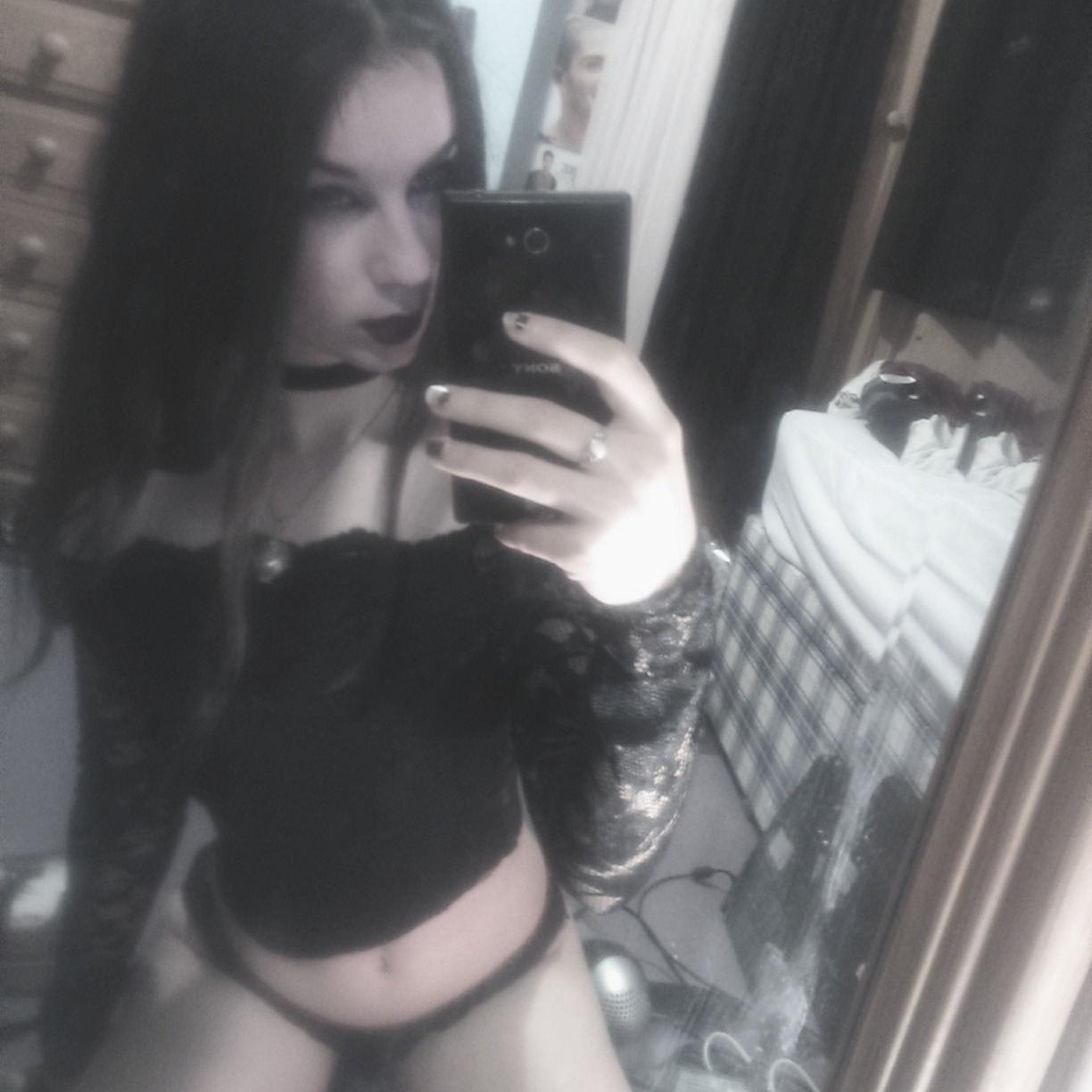 Black lacey clothes make me happy and so does being half naked. 