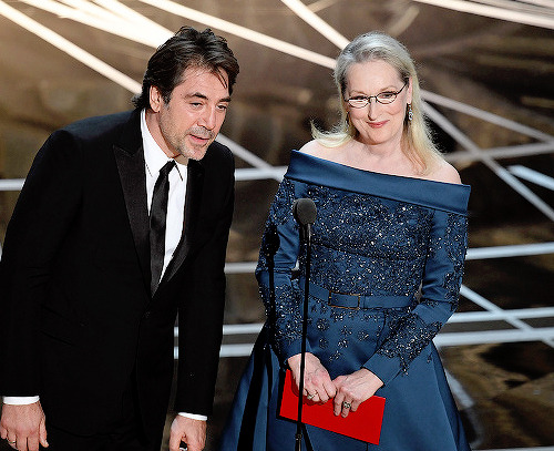 Javier Bardem and Meryl Streep speak onstage during the 89th Annual Academy Awards