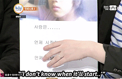  Woohyun’s pre-debut photo from his minihompy account and its dramatic caption.