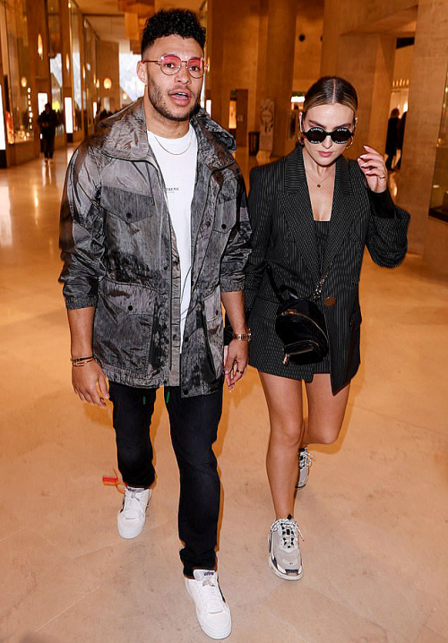 fyeahlittlemix:Perrie Edwards and Alex Oxlade-Chamberlain at the Off-White Fall Winter 2019 show dur