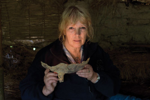 Witches of Cornwall(Archaeologist Jacqui Wood holds a fragment of a cauldron unearthed from a buried