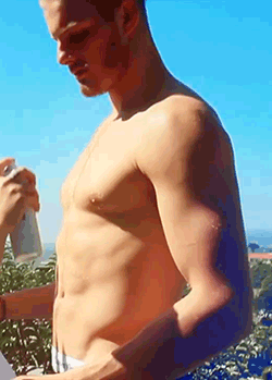 famousmeat:  Shirtless Alexander Ludwig sprayed wet for Bello Mag