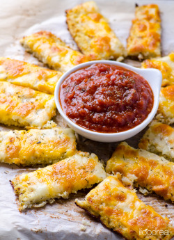 coelasquid:  krudman:  beautifulpicturesofhealthyfood:  Cauliflower ‘Bread’ Sticks - To-die-for mock bread-sticks made with cauliflower that are low in calories, carbs and fat….RECIPE INGREDIENTS: 1 head cauliflower, large (7” - 8” wide) &frac14;