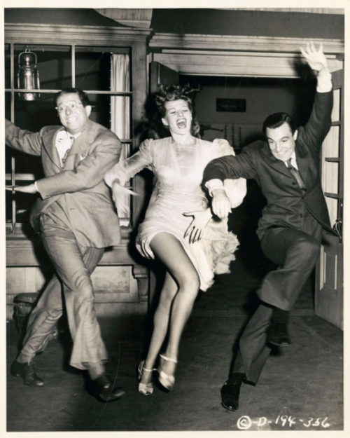 24hoursinthelifeofawoman:Phil Silvers, Rita Hayworth and Gene Kelly in “Cover Girl” directed by Char