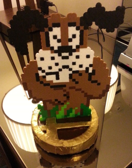 Duck Hunt dog in his classic mocking laugh.  Everything you see on this trophy is duct tape (except 