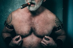 Cigar daddy playing with his nips