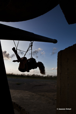 bondageisnotacrimeparis:  sunset in the Bunker (Normandie)  The 70th Anniversary of D-Day… A Tribute to Freedom Modele : Nais Photographer / Rigger : Amaury Grisel Facebook Ropes by Place des cordes