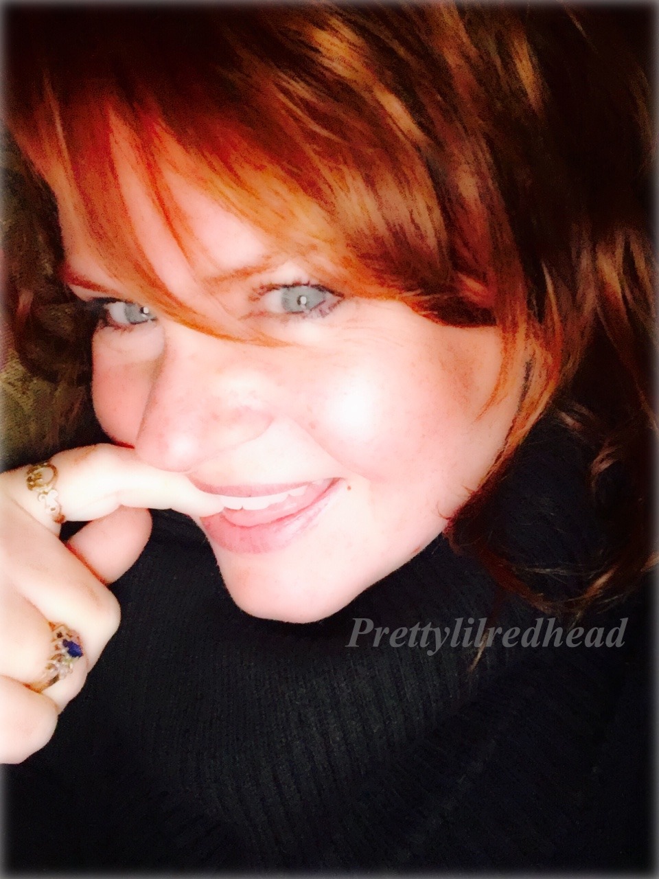 prettylilredhead:  Home from trick-or-treating wrapped in a blanket on my couch….🎃👻🦄👽💀🎃😈