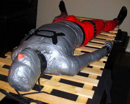 bondagejock:  Duct tape superhero theme mummification. 1 of 7 Sub: Bondagejock  Dom: TheUAJock 