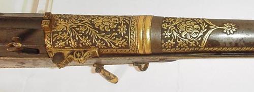 Ornate gold decorated matchlock torador musket originating from India, early 19th century.