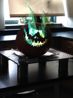 archiemcphee:  Science + Halloween = a jack-o’-lantern fit for the Headless Horseman himself. An awesome high school chemistry teacher dazzled their students by creating this phenomenal jack-o’-lantern with bright green flames burning inside its head.