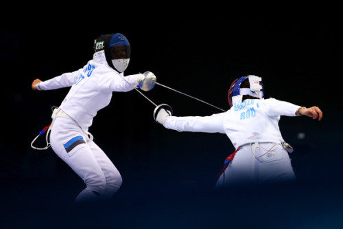 Porn Pics modernfencing:  [ID: two epee fencers engaging.]