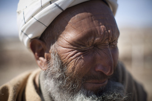 Mohammed Isaq weeps as he tells the story of his nephew’s arrest by U.S Special Forces in Maid