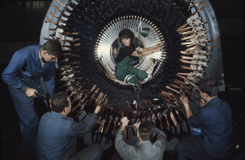 Porn photo natgeofound:  A female worker helps insulate