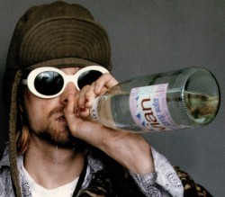 nirvananews:Kurt Cobain drinking evian spring water during a ‘93 photoshoot. 