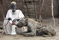 beautiesofafrique:  A man posed Friday with