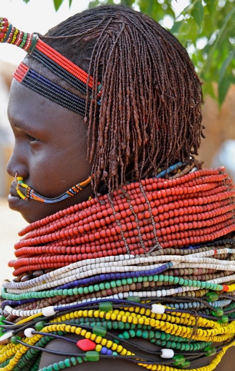 ourafrica:Also, nose chains are not exclusive to Indians only.  Above photo of Nyangatom woman of Et