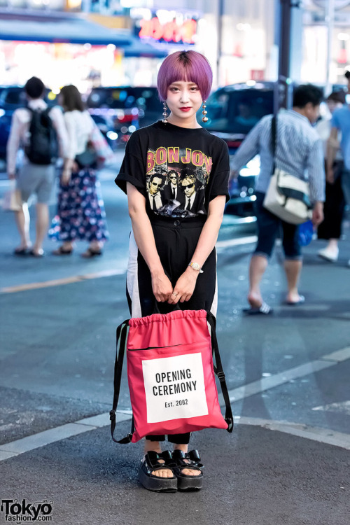 Nakyeong on the street in Harajuku wearing a Bon Jovi band tee with striped pants, platform bow sand