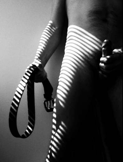 treatingpornasart: petitebisexual:  this kinda scares me, but excites me at the same time…  it’s the firmness of the leather and the cock in each hand, and the grip on each… 