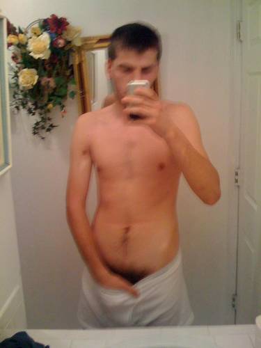 undie-fan-99:  Guy showing off in (what appears to be) his white Hanes boxerbriefs.