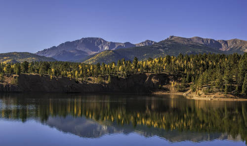 Reflections on Pikes Peak by Delores Poll