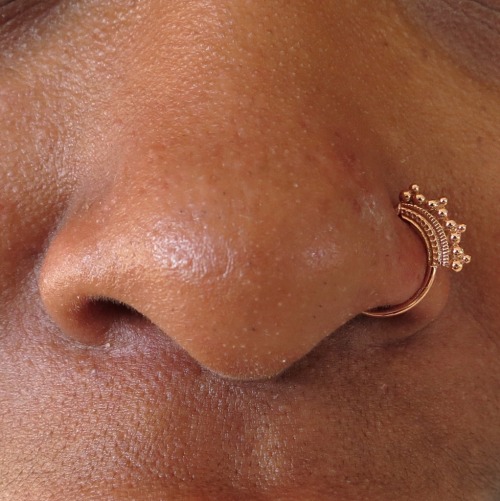 Healed nostril piercing with rose gold jewelry by BVLA