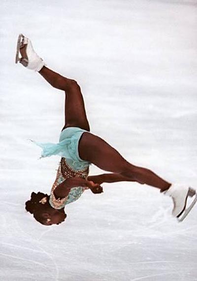 shotinthekidney: ineffectualdemon:  jinlinli:  chauvinistsushi:  erykahbaddont:  asiaraymonet:  Surya Bonaly, world renowned French skater whose trademark move is her backflip, where she only lands on one blade in order to keep the move legal. She’s