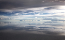 awkwardsituationist:  photos of and by michael and taylor kittell from bolivia’s remote salar de uyuni salt flat. at over four thousand square miles, it’s the largest salt flat on the planet. and with a variation in surface elevation of less than