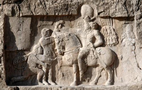 Roman emperor Valerian kneeling in front of his captor, Shapur IPerhaps a bit OT, but certainly an i